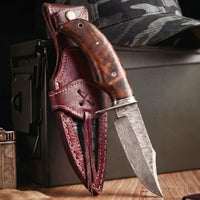 Bear Hunter Damascus Hunting Knife with its leather sheath